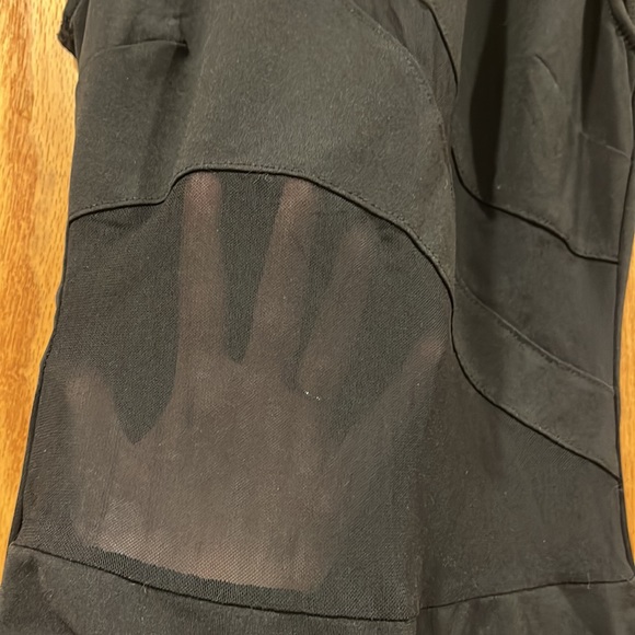 Black cutout body suit, high neck with cutouts on chest and abdomen. - Picture 3 of 4